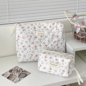 Floral quilted cotton makeup bag set with pink rose pattern and green ribbon detail