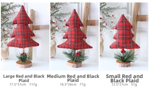 Three sizes of red and black plaid fabric Christmas trees with wooden bases and berries