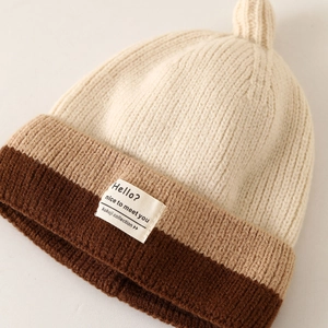 Kids striped knit beanie with beige and brown patchwork and English label detail