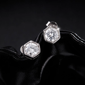 Elegant S925 sterling silver hexagonal stud earrings featuring 1 carat moissanite stones