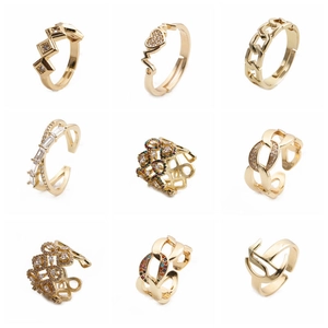 Macro showcase of nine gold rings with cubic zirconia and geometric vintage designs