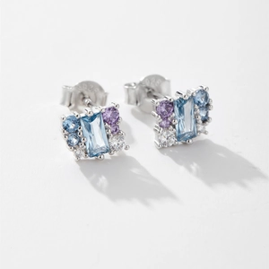Macro detail of S925 sterling silver stamp on stud earrings with zircon stones