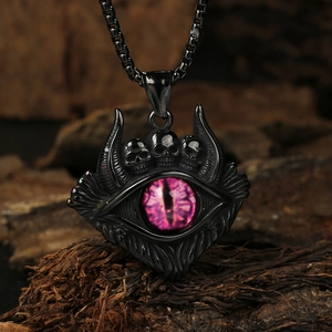 Gothic punk devil eye pendant with three skulls and magenta dragon eye on wood