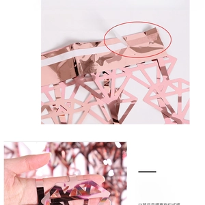 Detail of rose gold diamond foil fringe curtain with double-layer waist and adhesive tape