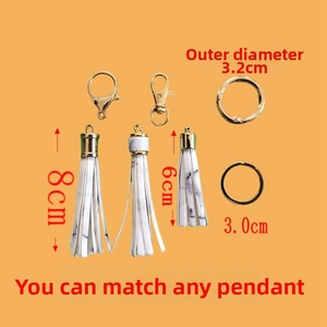 Detail of DIY silicone bead keychain kit featuring PU leather tassels and golden lobster clasps