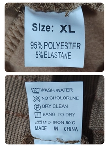 Detail view of clothing labels showing XL size and 95% polyester fabric composition