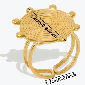 Detail of golden vortex ring showing top diameter 2.2cm and inner ring size 1.7cm