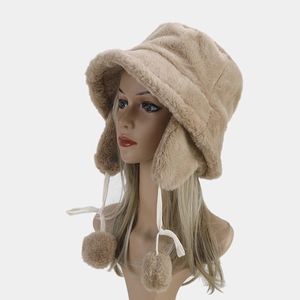 Plush camel faux fur winter bucket hat with ear flaps and white decorative pompom ties