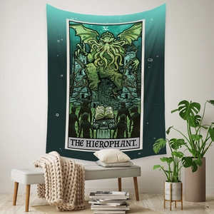 Bohemian Cthulhu Tarot tapestry hanging on a white wall with modern home decor