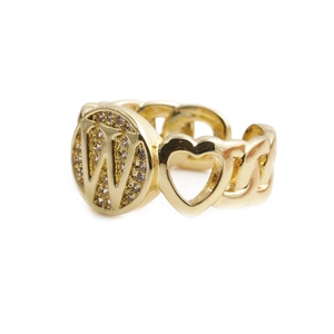 Detail of gold watchband style ring with crystal pave letter W and cutout heart