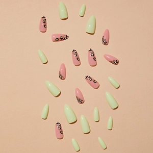 Press-on nail set with light green color, pink leopard print, and sparkling gold glitter