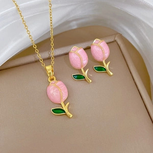Elegant gold titanium steel jewelry set with pink tulip flower pendant and stud earrings
