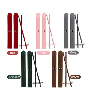 Miniature Christmas sled and ski set available in five colors for winter decor