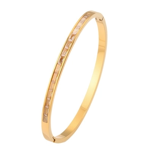 Elegant gold titanium steel bracelet featuring a single row of rectangular crystals