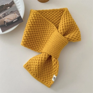 Cozy winter knit cross scarf for women, warm yellow lazy neck warmer collar, soft fashion.