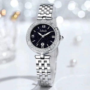 Women's steel watch with blue starry sky dial, date function, and crystal bezel