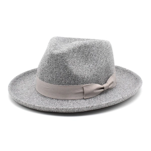 Detail view of grey wool fedora hat with a decorative grosgrain ribbon and bow accent