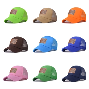 Breathable mesh trucker hats with American flag leather patch in nine assorted colors