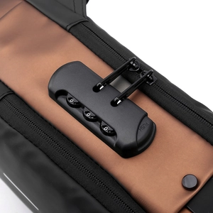 Detail of waterproof crossbody bag featuring a secure three-digit combination lock