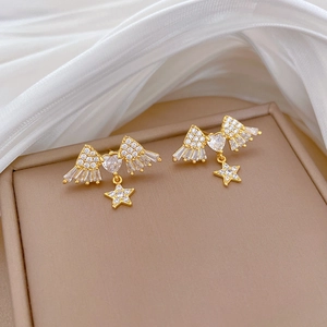 Golden titanium steel jewelry set featuring zircon-encrusted star and heart wing earrings