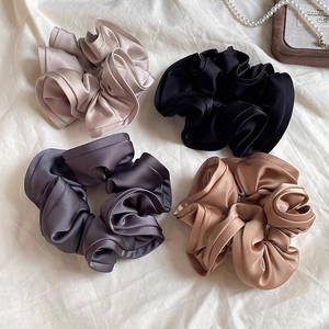 Satin silk scrunchies set in four colors with retro ruffled edge design and soft luster