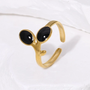 Anello regolabile in acciaio inossidabile dorato con foglie in smalto nero su pietra