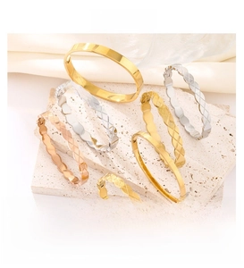 Luxe quilted pattern and smooth metal bangles in gold, silver, and rose gold finishes