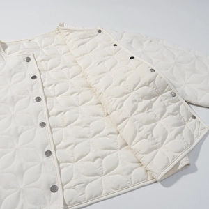 Chic cream white quilted jacket for women with petal pattern and metal snap buttons