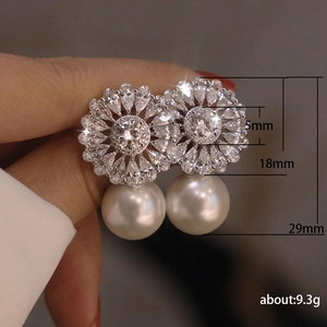 Elegant floral zircon and pearl drop earrings in silver with product size and weight specs