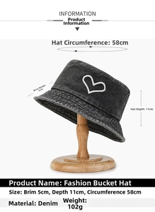 Detail view of denim bucket hat with size specs, 5cm brim and 58cm circumference