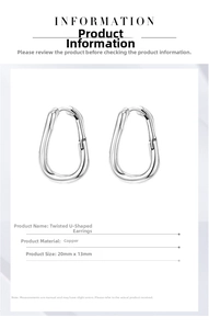 Détail montrant les boucles d'oreilles torsadées en U, cuivre, dimensions 20mm x 13mm