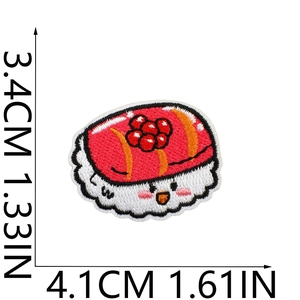 Detail view of sushi embroidery patch with precise measurement markings in cm and inches