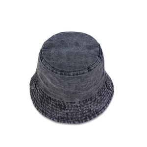 Detail view of washed dark gray denim bucket hat showing vintage fabric texture