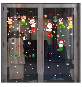 Christmas window stickers featuring Santa, reindeer, and Merry Christmas text on glass doors