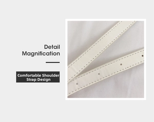 Close-up of white leather shoulder strap with fine stitching and adjustable holes