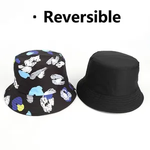 Reversible bucket hat with colorful graffiti print and solid black sun protection design