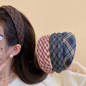 Detail of padded stripe headbands in multiple colors showing texture and thickness