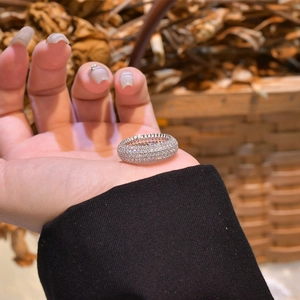 Luxurious five-row pavé set cubic zirconia ring with sparkling crystals on a silver band