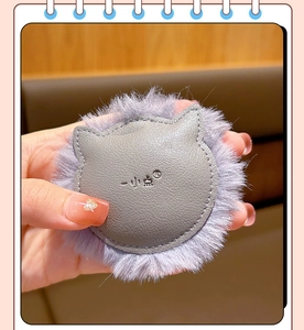 Detailed back view of a grey cat-shaped plush charm featuring embossed PU leather detail