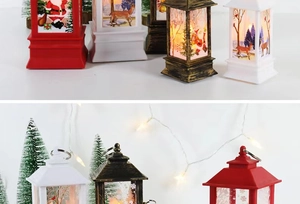 Detail of festive Christmas lantern with Santa Claus scene and warm LED light glow