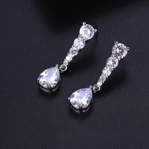 Elegant silver long drop earrings featuring pear-shaped AAA zircon and round crystals