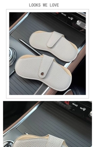 Close-up of beige pebble leather car sunglass pouches with secure metal snap closures