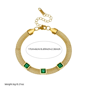 Gold plated stainless steel mesh chain bracelet with three green square gemstones