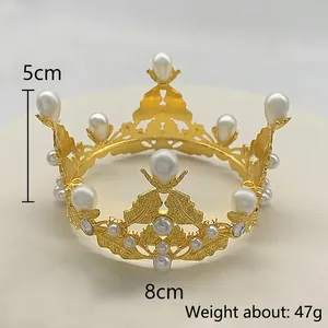 Detailed view of 5cm gold tiara with white pearls, height 5cm and 8cm base diameter