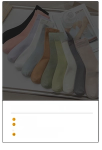 Detailed view of colorful cotton mid-calf socks collection in various pastel colors