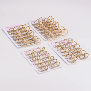 Set of 48 pairs of golden twisted cable stainless steel hoop earrings on display cards