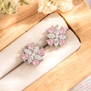Daisy flower earrings with pink and white cubic zirconia in a wooden jewelry gift box