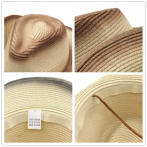 Dettaglio del cinturino interno regolabile e trama in 100% paglia di carta del cappello