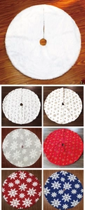Detailed collection of plush white and patterned Christmas tree skirts in various designs