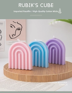 Detailed view of pastel rainbow arch candles crafted from premium wax and cotton wicks